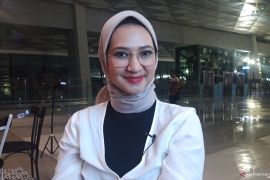 Angkie Yudistia, sosok berkebutuhan khusus juru bicara Presiden