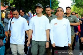 Youngest son of President walks in Murjani Square, Banjarbaru