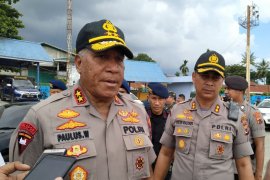 Empat warga Papua ditangkap polisi karena pakai atribut Papua Merdeka