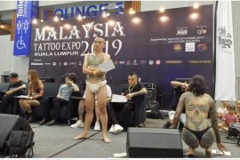 Kementerian Pariwisata Malaysia tindak panitia pertunjukan tato setengah telanjang