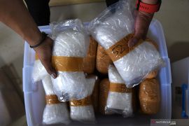 North Sumatra police officer arrested in drug case