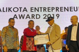 Nadjmi Adhani wins award from MarkPlus.Inc