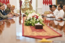President receives World Stop TBC Action delegation at Merdeka Palace