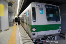 Di balik  kereta bawah tanah Jepang