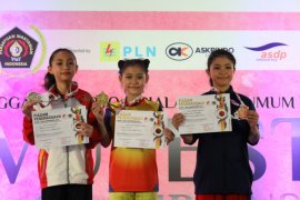 Tekad Christina mengikuti jejak prestasi wushu Edgar dan Juwita