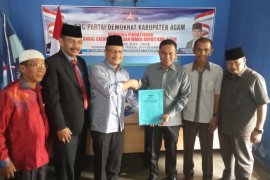 Kompak,  Andri Warman-Irwan Fikri langsung berpasangan mendaftar maju Pilkada Agam ke Demokrat