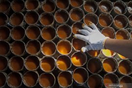 Kue keranjang menu wajib bagi Tionghoa saat Imlek