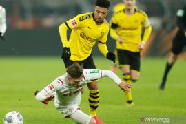 Jadon Sancho dan Manuel Akanji didenda karena tak gunakan masker saat potong rambut