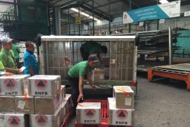 Garuda angkut bantuan 10.000 masker BNPB untuk WNI di  Tiongkok