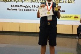 Rio Stevanus siswa SMPN 2 Pandan Nauli raih medali emas Olimpiade Sains