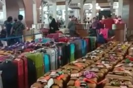 Suasana saat penangguhan umrah di Suta