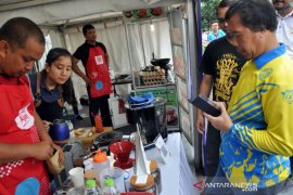 Pembayaran non tunai QRIS