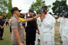 Mulai drone hingga watercanon, begini upaya polisi lawan COVID-19 di Riau