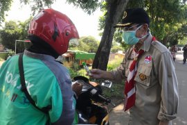 Pramuka Kwarda Banten bagikan 3.000 masker dan cairan pembersih tangan