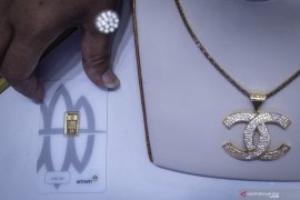 Harga emas Antam naik Rp5.000 menjadi Rp913.000 per gram