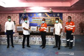 Tambang Martabe serahkan bantuan APD  untuk wilayah Tapteng