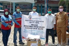 PT Supreme Energy salurkan bantuan APD ke Puskesmas