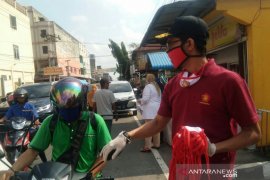 Gerindra Rokan Hilir serentak bagikan masker di tiga titik