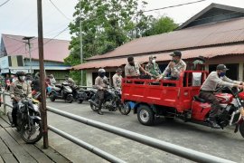 Polri-TNI gelar patroli gabungan di Asmat untuk cegah virus corona