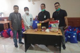 Foto - Pegadaian salurkan bantuan APD-Sembako melalui Satgas Covid-19 BUMN