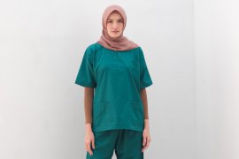 Alat Pelindung Diri karya tangan perancang merangkap dokter gigi