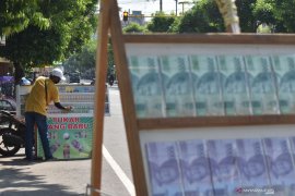 Jasa Penukaran Uang Batu