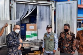 Alat tes PCR bantuan Singapura telah tiba di Jambi