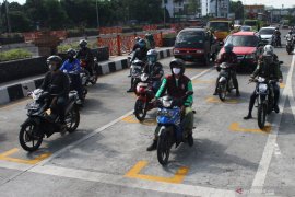 Tips aman pengendara motor di era new normal