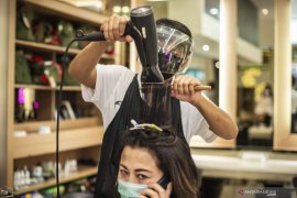Ini bahaya pelurusan dan pengeritingan rambut