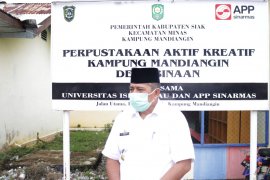 Melihat geliat perpustakaan aktif kreatif Kampung Mandiangin Minas
