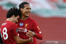 Klasemen Liga Inggris: Liverpool 11 poin dari rekor "centurion"