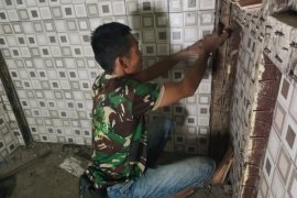 Perbaikan toilet Gereja Santo Yohanes melalui program TMMD