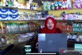 Warung digital mitra Grabkios alami kenaikan omset 50 persen