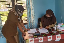 Pemakaian masker wajib di perkantoran Pemkab Simalungun cegah penyebaran COVID-19