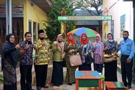 Inhil ubah pustaka tradisional ke digital