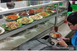 Bangkitkan UMKM, GrabKitchen hadirkan Kolaborasi Dapur Bersama di Makassar