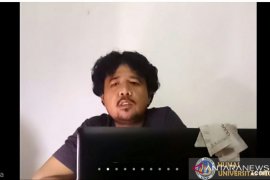 Pewarta foto garda terdepan bersama dengan kameramen