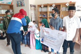 Peringati HUT ke-15, Pertamina Rantau bagi sembako dan santuni yatim