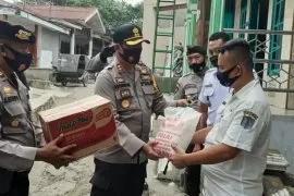 Kapolres Binjai bagikan sembako bagi warga terdampak banjir