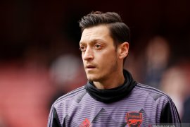 Arsenal dan pemain Mesut Oezil akhirnya pisah jalan