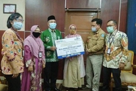 Plt Bupati Merangin serahkan santunan Taspen untuk keluarga H Tamami