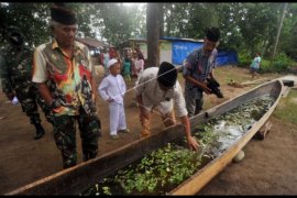 Tradisi tolak bala di Padang
