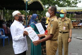1.038 pelaku usaha mikro Tanah Laut kembali terima BPUM