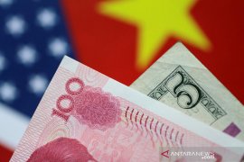 Yuan melonjak 238 basis poin, jadi 6,4069 terhadap dolar AS