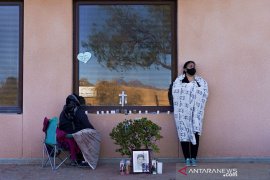 CDC AS merekomendasikan masa karantina yang lebih singkat