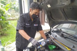ExxonMobil-Garasi.id ajak servis mobil di rumah jelang musim liburan