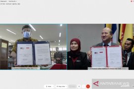 Perpustakaan PCR bertukar koleksi buku dengan PSA Malaysia