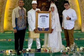 Pertama di Pekanbaru, menikah bermahar 11 ribu lembar saham