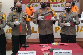 Papua's Intan Jaya civil servant detained for arms trade: police