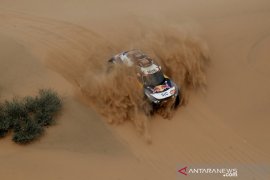 Satu etape lagi, Stephane  Peterhansel kunci titel ke-14 Reli Dakar